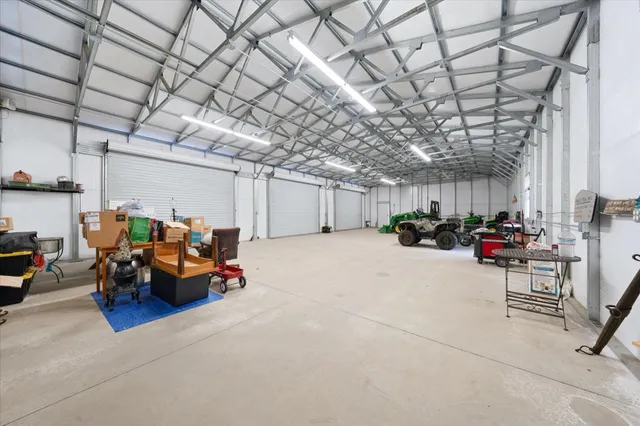 a view of a balcony with wooden floor and fence