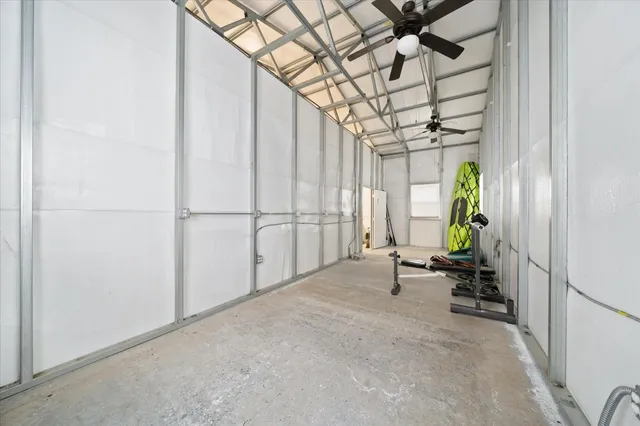 a view of balcony with wooden floor and fence