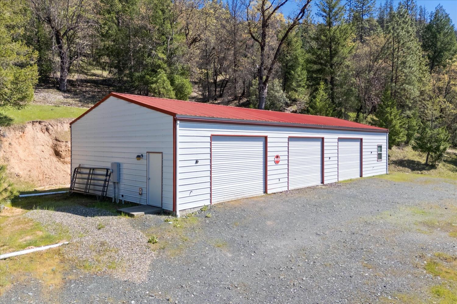 2995 Goose Ranch Road Lewiston, CA 96052 - Photo 56 of 87 a view of a house with a garage and yard