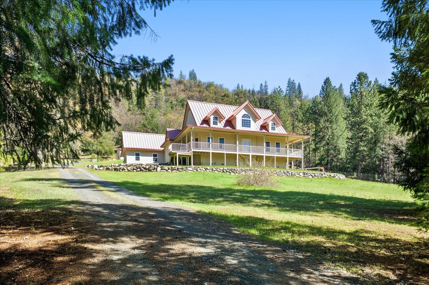 2995 Goose Ranch Road Lewiston, CA 96052 - Photo 60 of 87 a front view of a house with a yard and trees