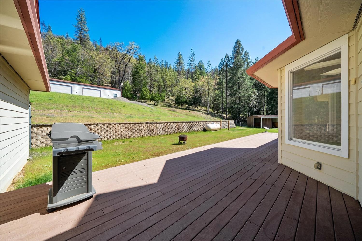 2995 Goose Ranch Road Lewiston, CA 96052 - Photo 69 of 87 a view of a swimming pool with a patio