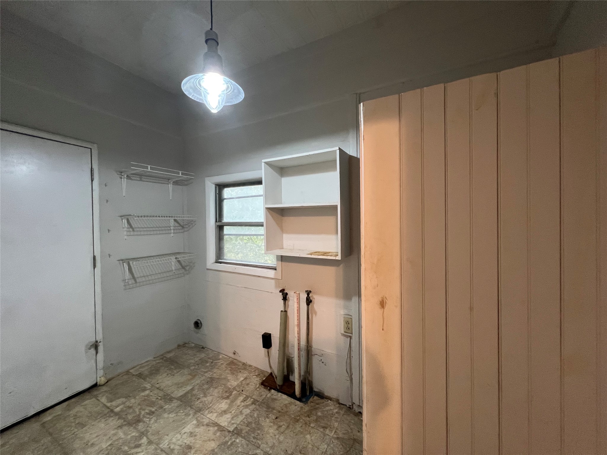 1016 North 3rd Street Temple, TX 76501 - Photo 22 of 29 Large laundry area with door leading to the back yard