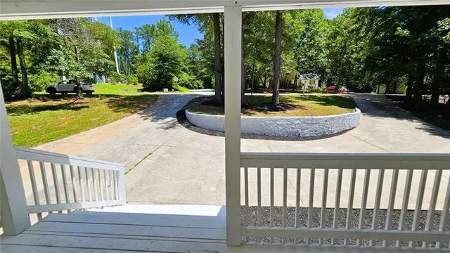 a view of swimming pool from a balcony