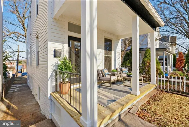 a view of a living room and a balcony