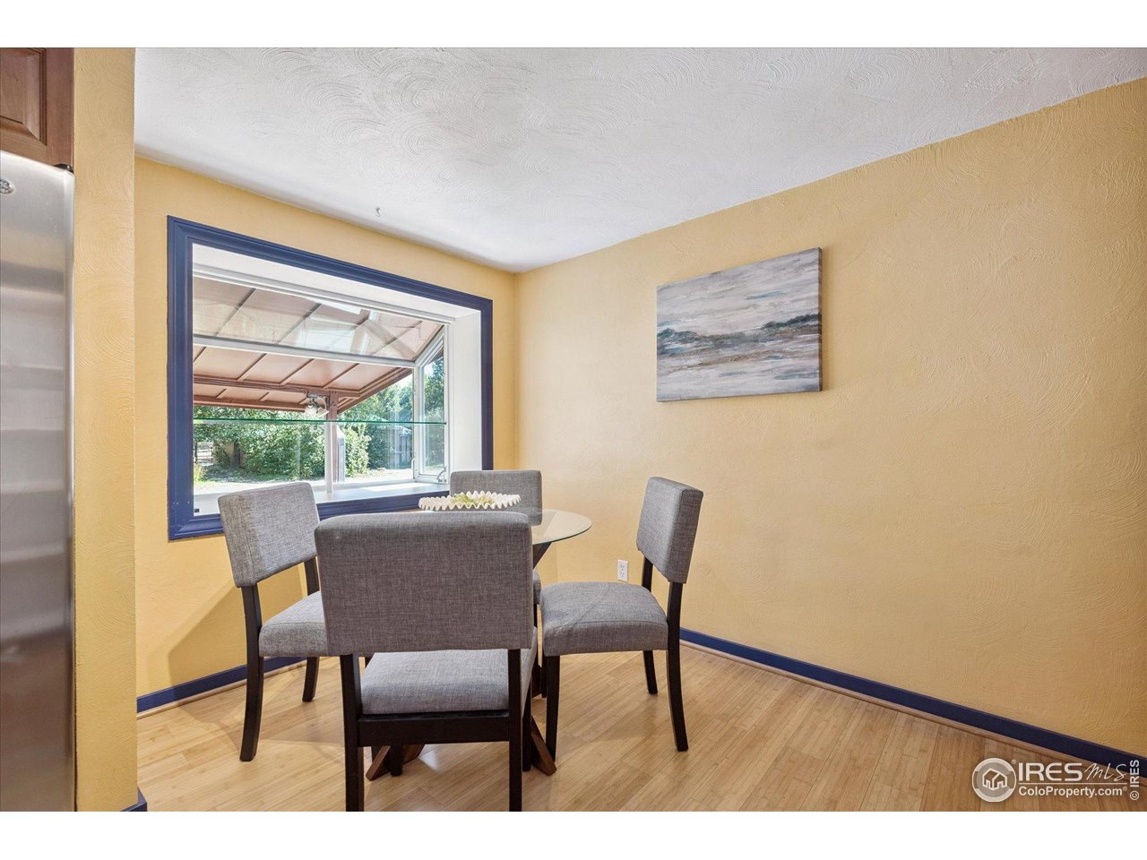1351 Marshall Road Boulder, CO 80305 - Photo 17 of 46 a view of a dining room with furniture and a window