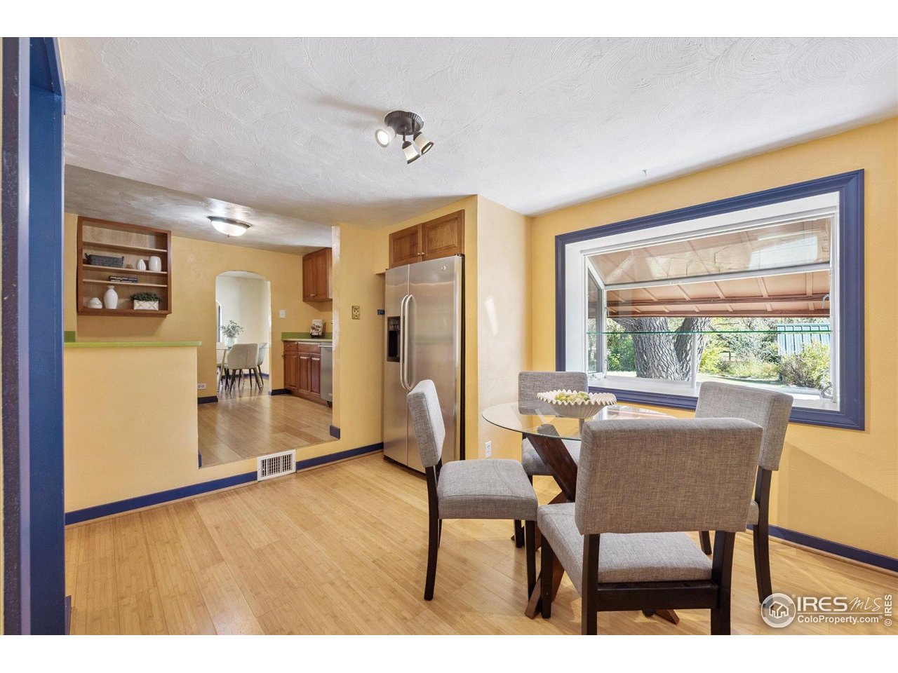 1351 Marshall Road Boulder, CO 80305 - Photo 18 of 46 a dining room with furniture and a window
