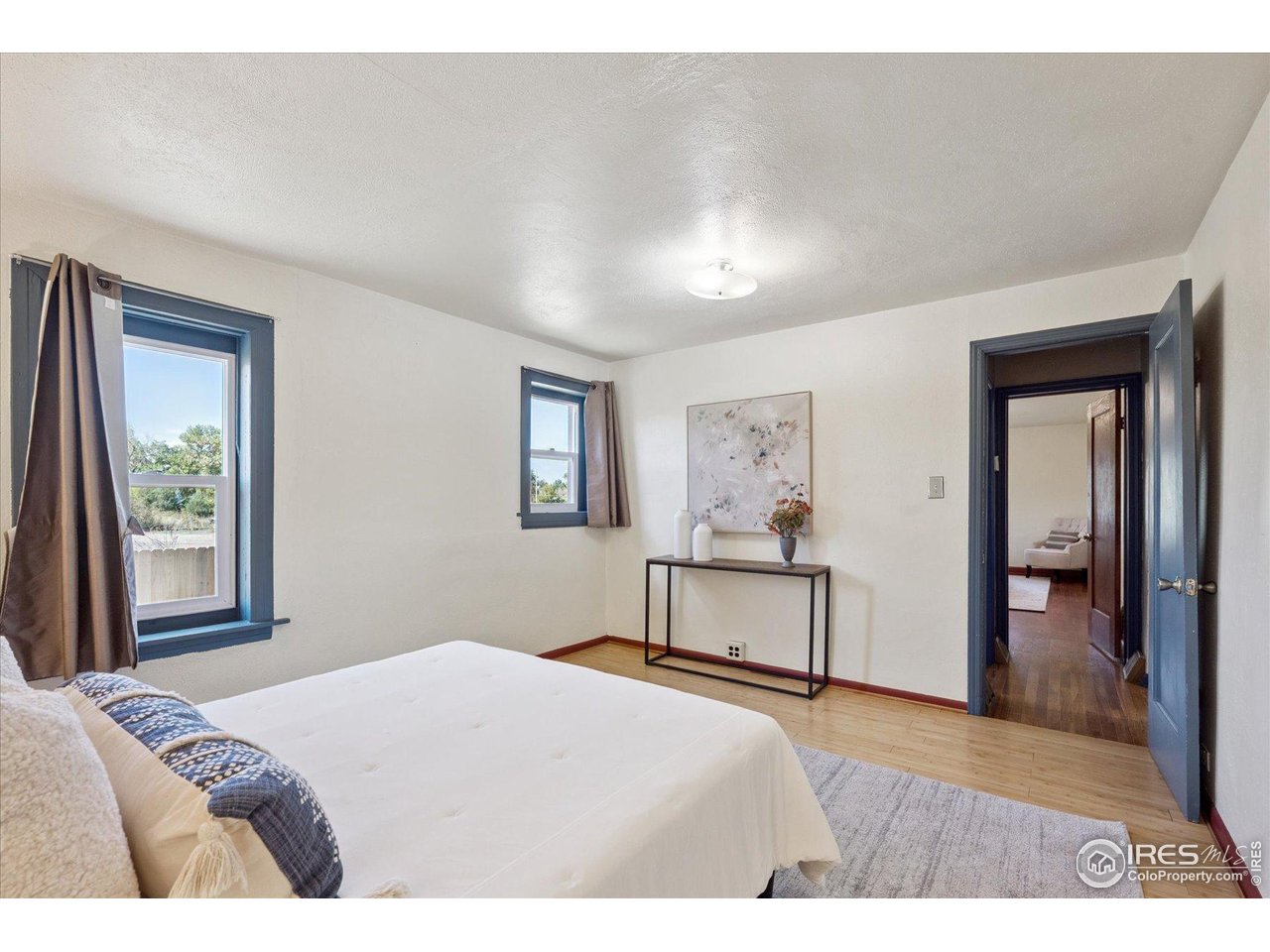 1351 Marshall Road Boulder, CO 80305 - Photo 20 of 46 a bedroom with a bed and a window