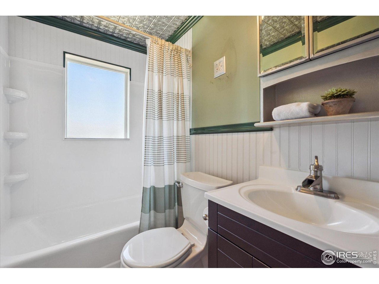1351 Marshall Road Boulder, CO 80305 - Photo 23 of 46 a bathroom with a sink a toilet and shower