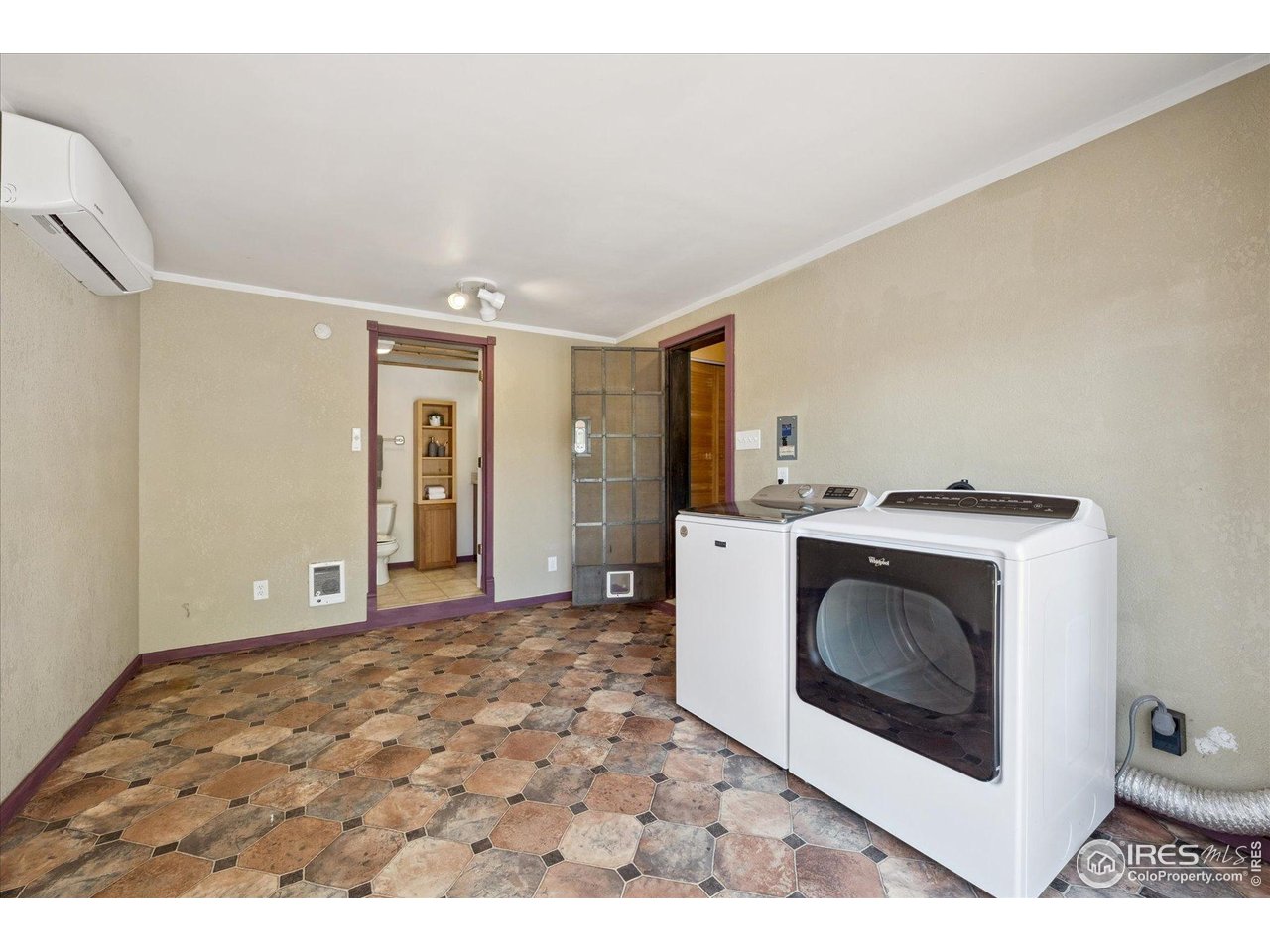 1351 Marshall Road Boulder, CO 80305 - Photo 28 of 46 a view of a hallway with washer and dryer