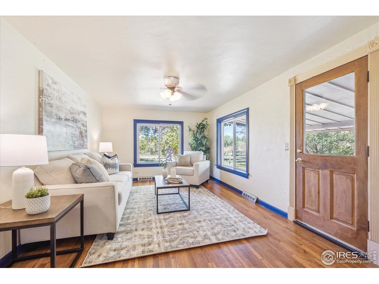 1351 Marshall Road Boulder, CO 80305 - Photo 3 of 46 a living room with furniture and wooden floor