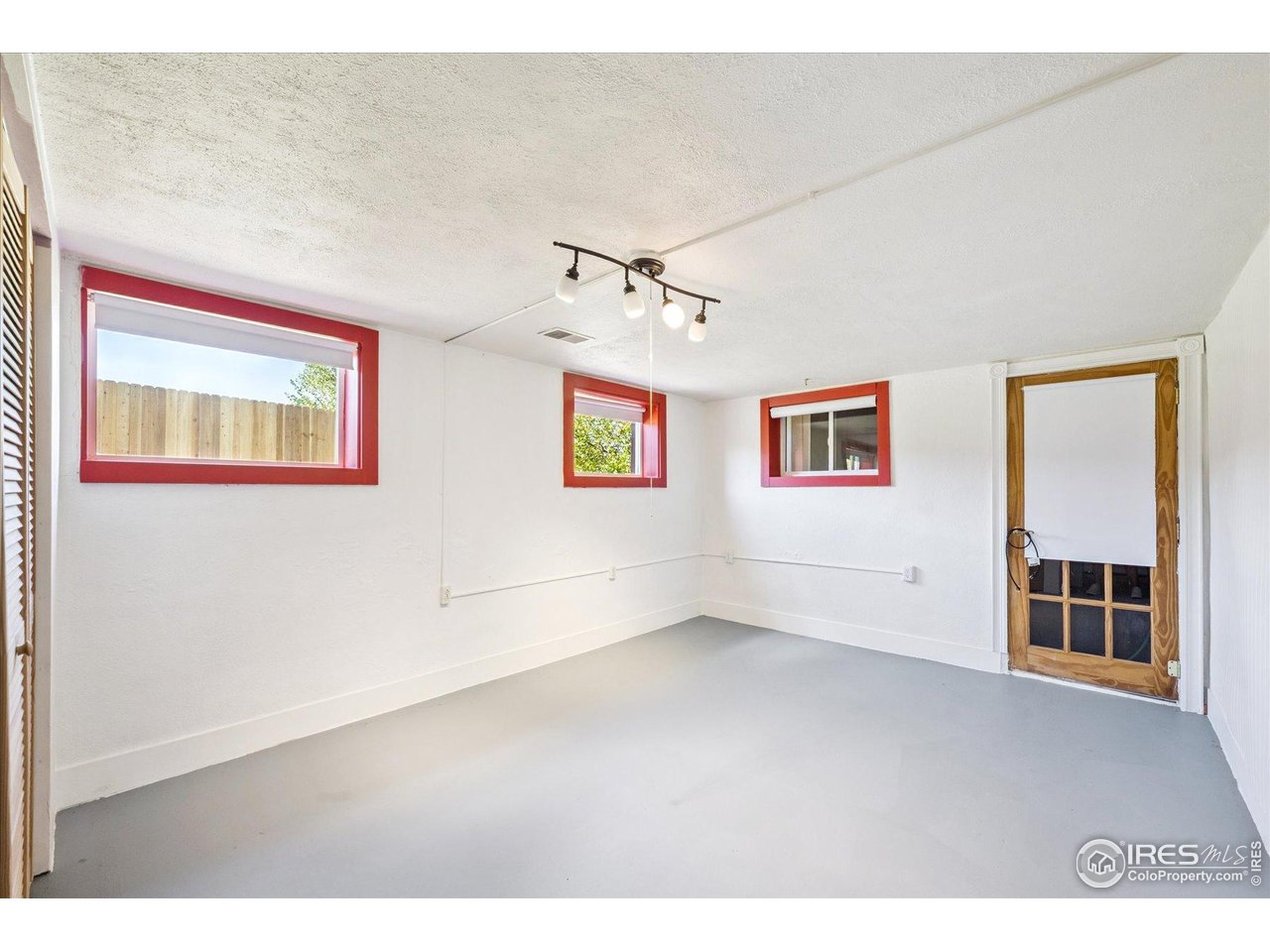 1351 Marshall Road Boulder, CO 80305 - Photo 31 of 46 a view of an empty room with a ceiling fan