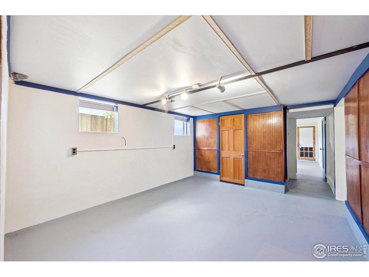 1351 Marshall Road Boulder, CO 80305 - Photo 32 of 46 a view of an empty room with a window