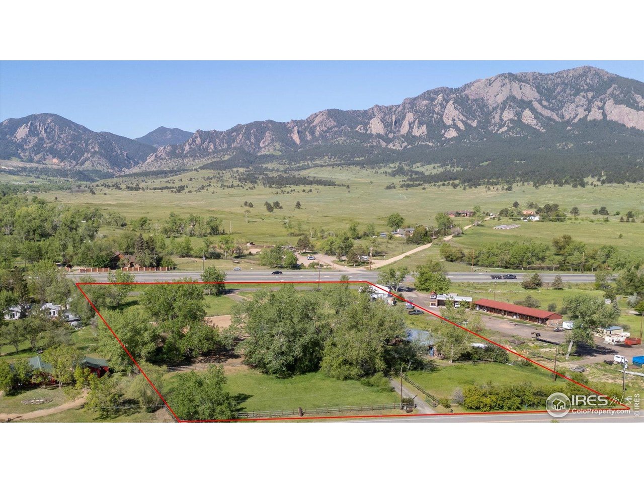 1351 Marshall Road Boulder, CO 80305 - Photo 40 of 46 a picture of city view with mountain and trees in the background
