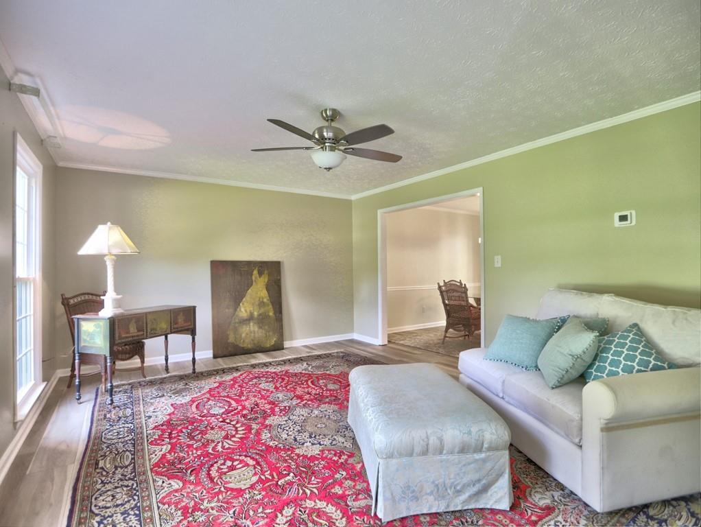 4512 Woodlawn Lake Drive Marietta, GA 30068 - Photo 18 of 55 a living room with furniture and a rug