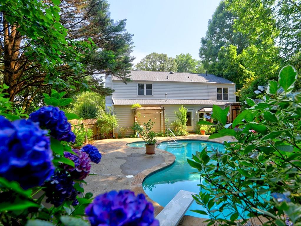 4512 Woodlawn Lake Drive Marietta, GA 30068 - Photo 2 of 55 a front view of a house with a yard