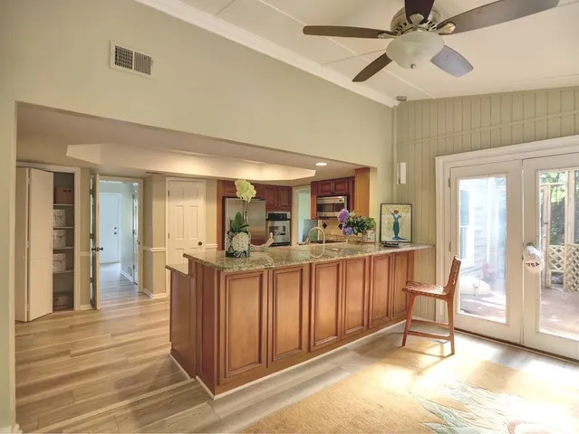 a view of an entryway with a floor to ceiling window