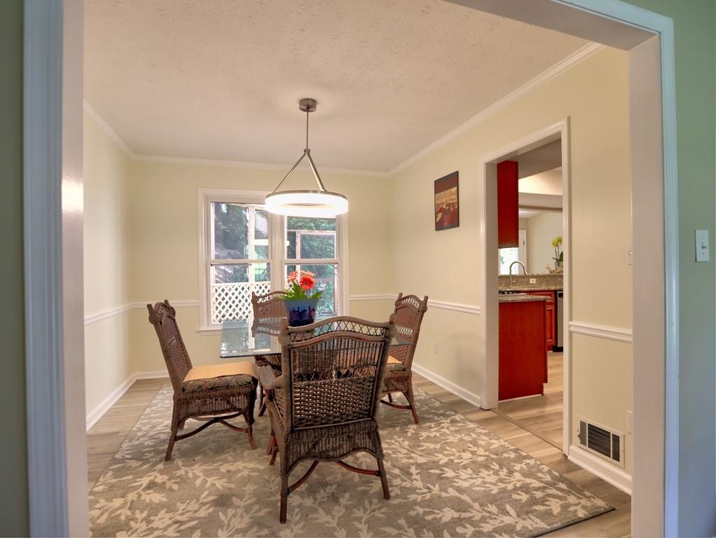 4512 Woodlawn Lake Drive Marietta, GA 30068 - Photo 27 of 55 a view of a dining room with furniture