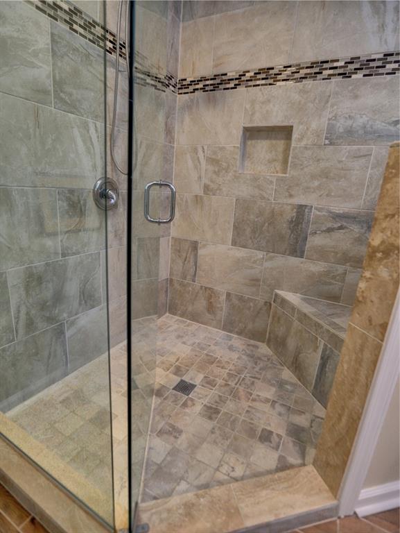 4512 Woodlawn Lake Drive Marietta, GA 30068 - Photo 30 of 55 a bathroom with a shower
