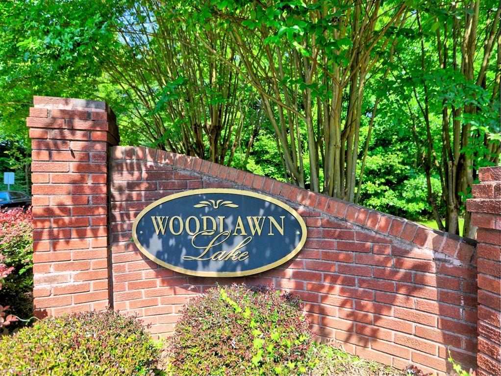 4512 Woodlawn Lake Drive Marietta, GA 30068 - Photo 44 of 55 a sign that is on the side of a building