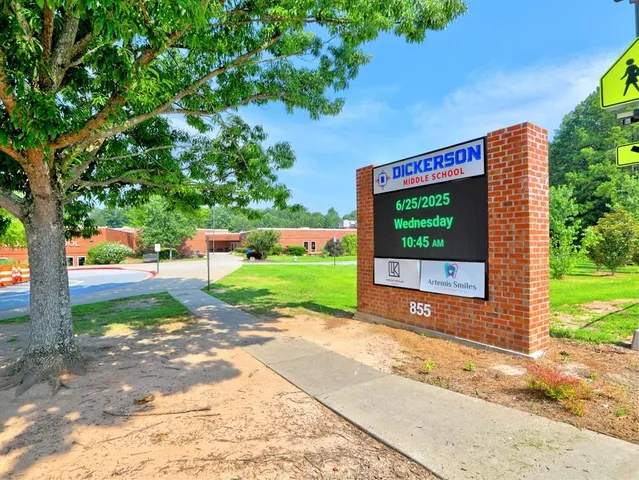 a view of a building with a street view