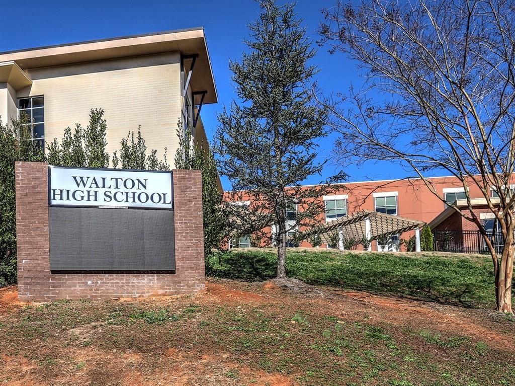 4512 Woodlawn Lake Drive Marietta, GA 30068 - Photo 47 of 55 a sign on the side of a building