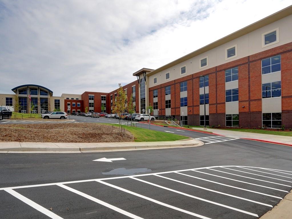 4512 Woodlawn Lake Drive Marietta, GA 30068 - Photo 48 of 55 a view of a building and a street