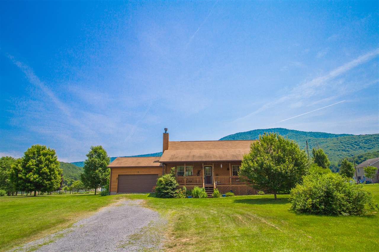 2888 Vaughn Summit Road Luray, VA 22835 - Photo 1 of 1 a view of a house with a big yard