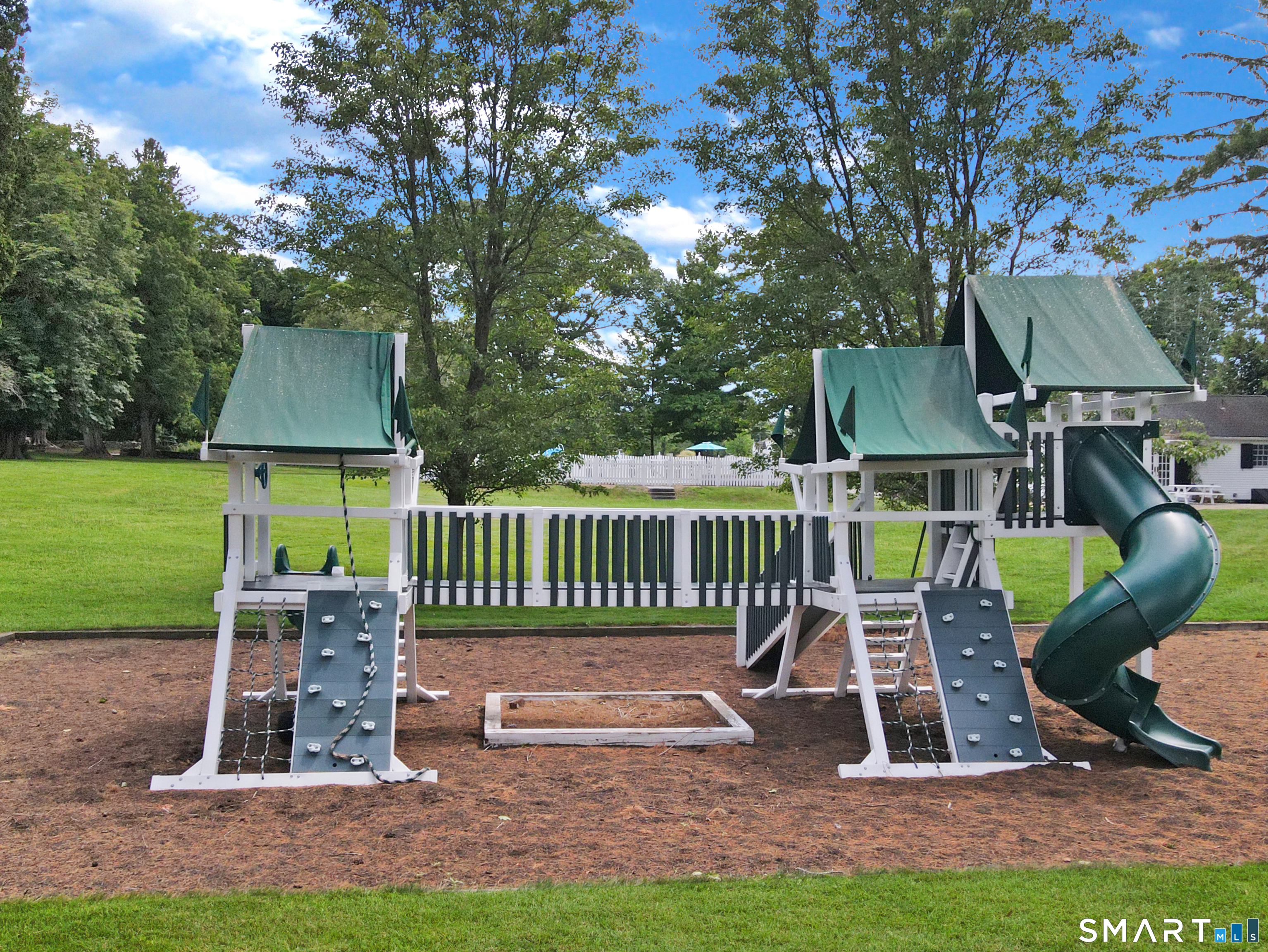 433 Wrights Crossing Road Pomfret Center, CT 06259 - Photo 28 of 40 A playscape located just off the Pool Cottage. Lots of room to run around and play!