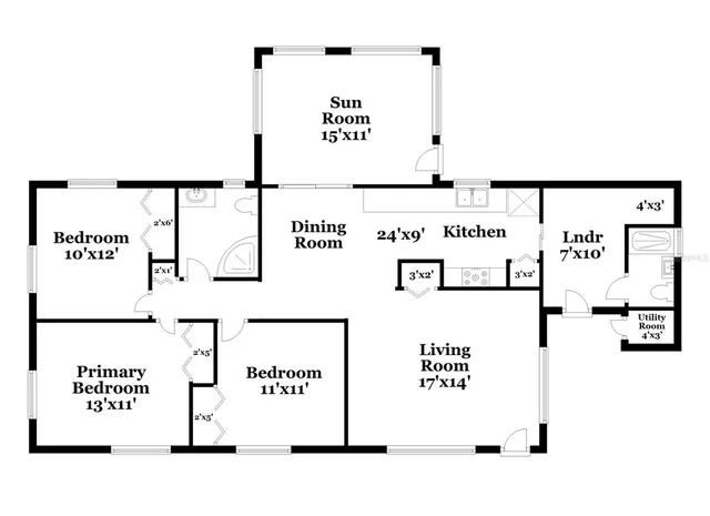 a picture of a park with a white wall and sign