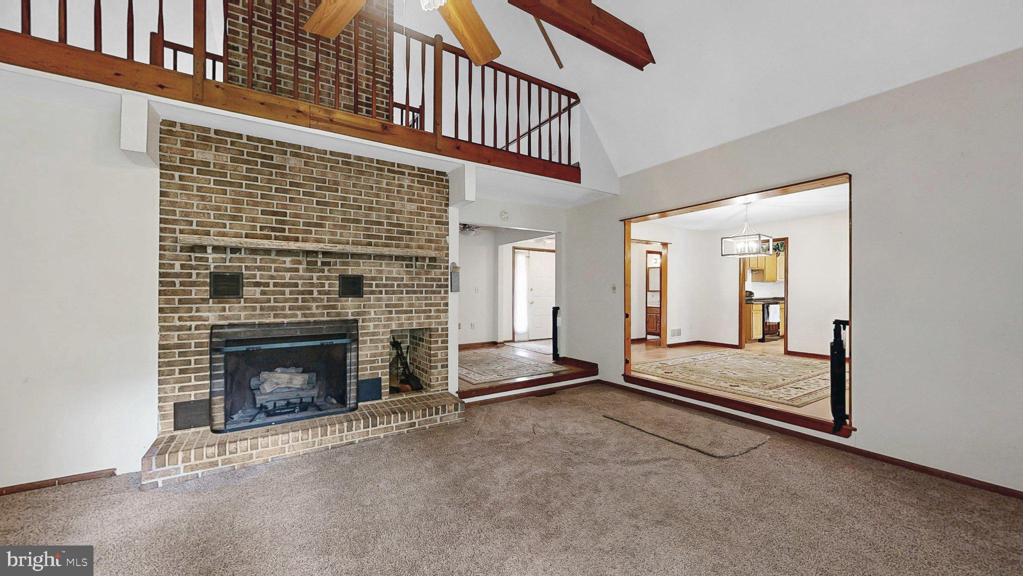 163 Pratts Branch Road Felton, DE 19943 - Photo 15 of 55 Spacious living area with rustic charm.