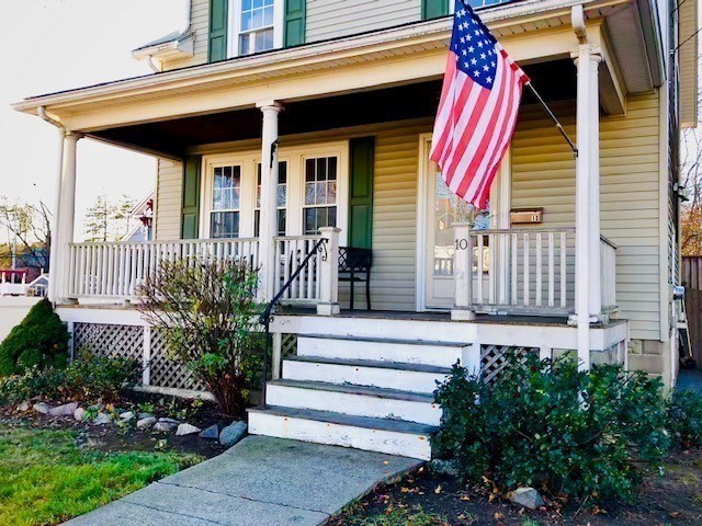 10 Summer Street Saugus, MA 01906 - Photo 2 of 42 a front view of a house with a garden