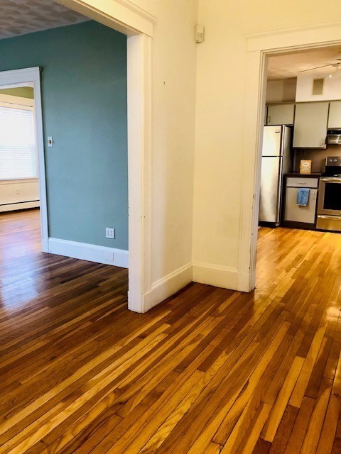 10 Summer Street Saugus, MA 01906 - Photo 7 of 42 a view of a room with wooden floor
