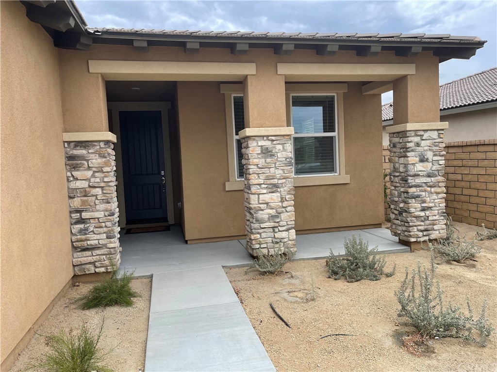 40274 Vivaldi Court Indio, CA 92203 - Photo 2 of 23 a view of front door of house