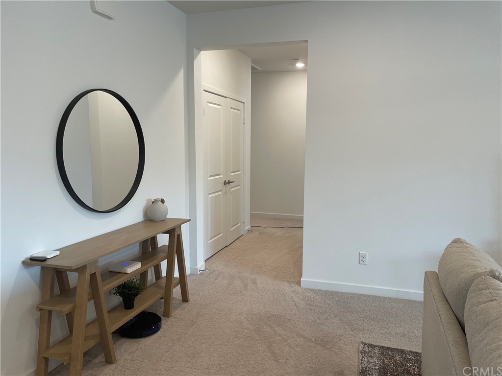 40274 Vivaldi Court Indio, CA 92203 - Photo 7 of 23 a view of a livingroom with furniture and a mirror