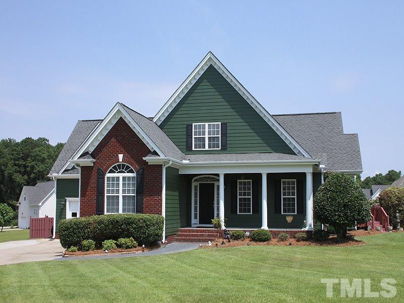 1036 Newburgh Circle Raleigh, NC 27603 - Photo 1 of 25 a front view of a house with a yard