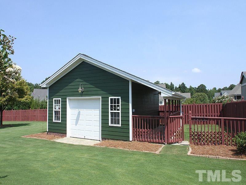 1036 Newburgh Circle Raleigh, NC 27603 - Photo 24 of 25 a front view of a house with backyard