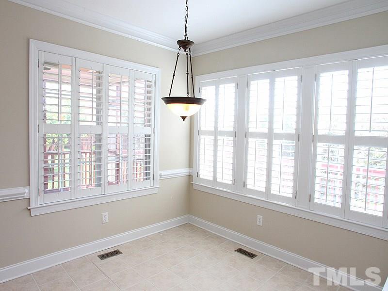 1036 Newburgh Circle Raleigh, NC 27603 - Photo 6 of 25 a view of an empty room with a window
