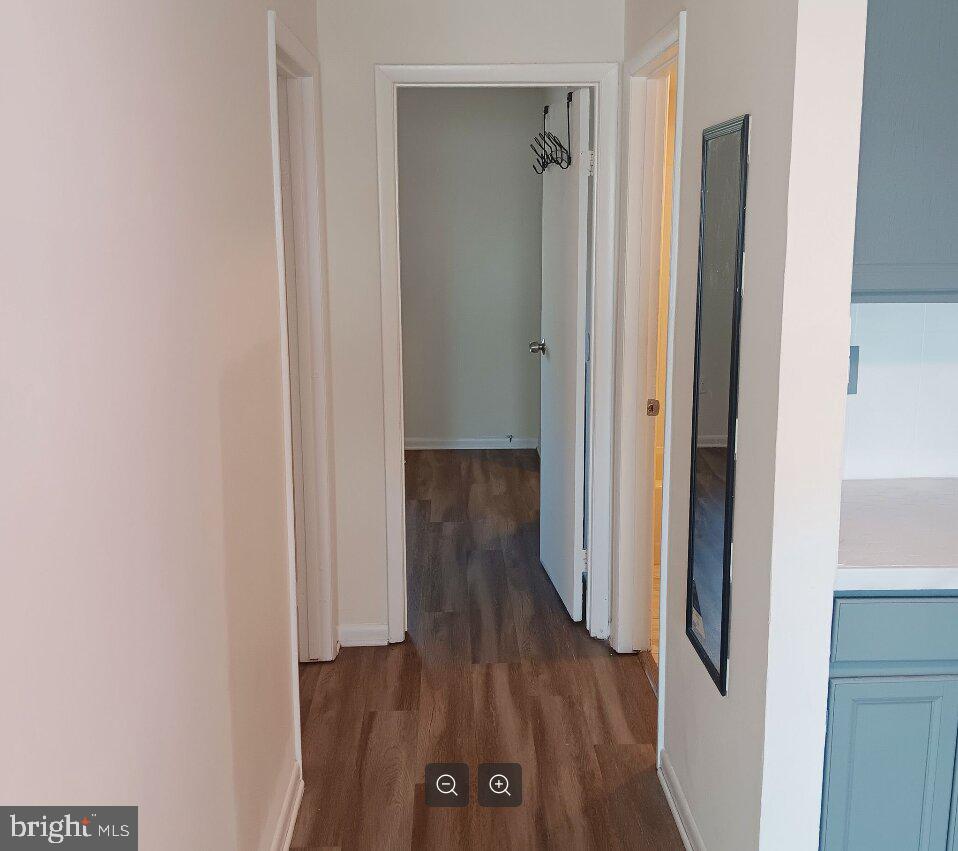 5304 Jackson Street, Unit 2 Philadelphia, PA 19124 - Photo 4 of 6 a view of a hallway with wooden floor
