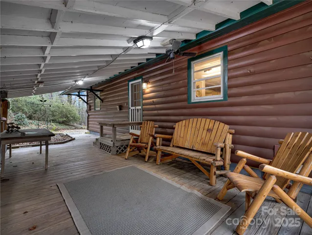 a view of a chairs and table in a patio