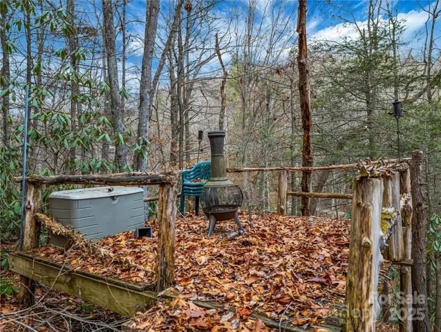a view of a balcony with chairs