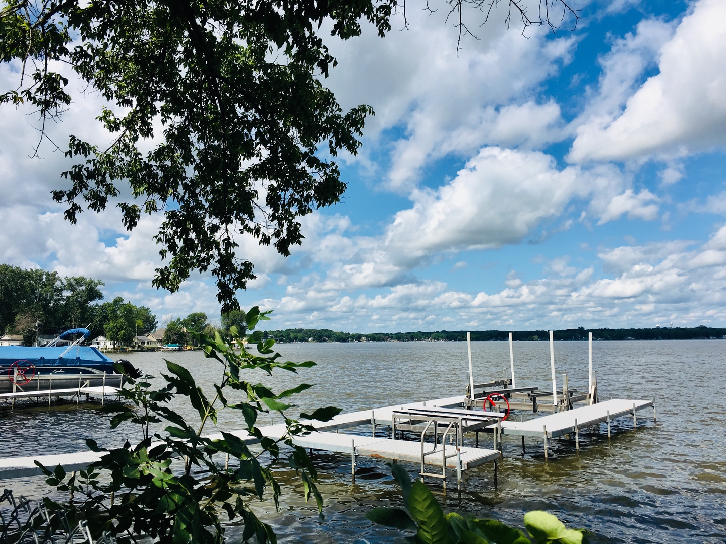 156 Eagle Point Road Fox Lake, IL 60020 - Photo 3 of 57 a view of a lake with sitting area