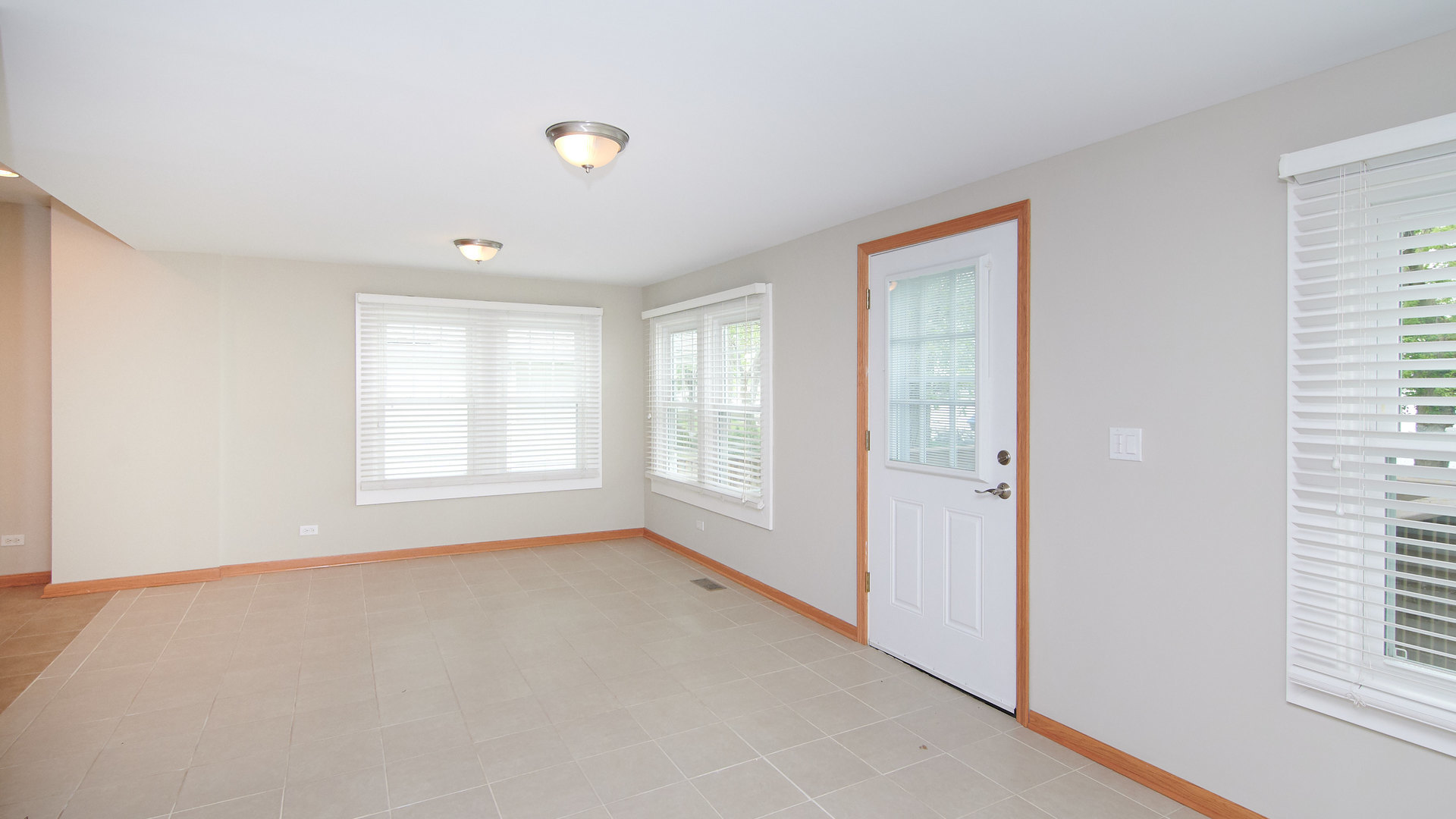 156 Eagle Point Road Fox Lake, IL 60020 - Photo 22 of 57 a view of an empty room with a window