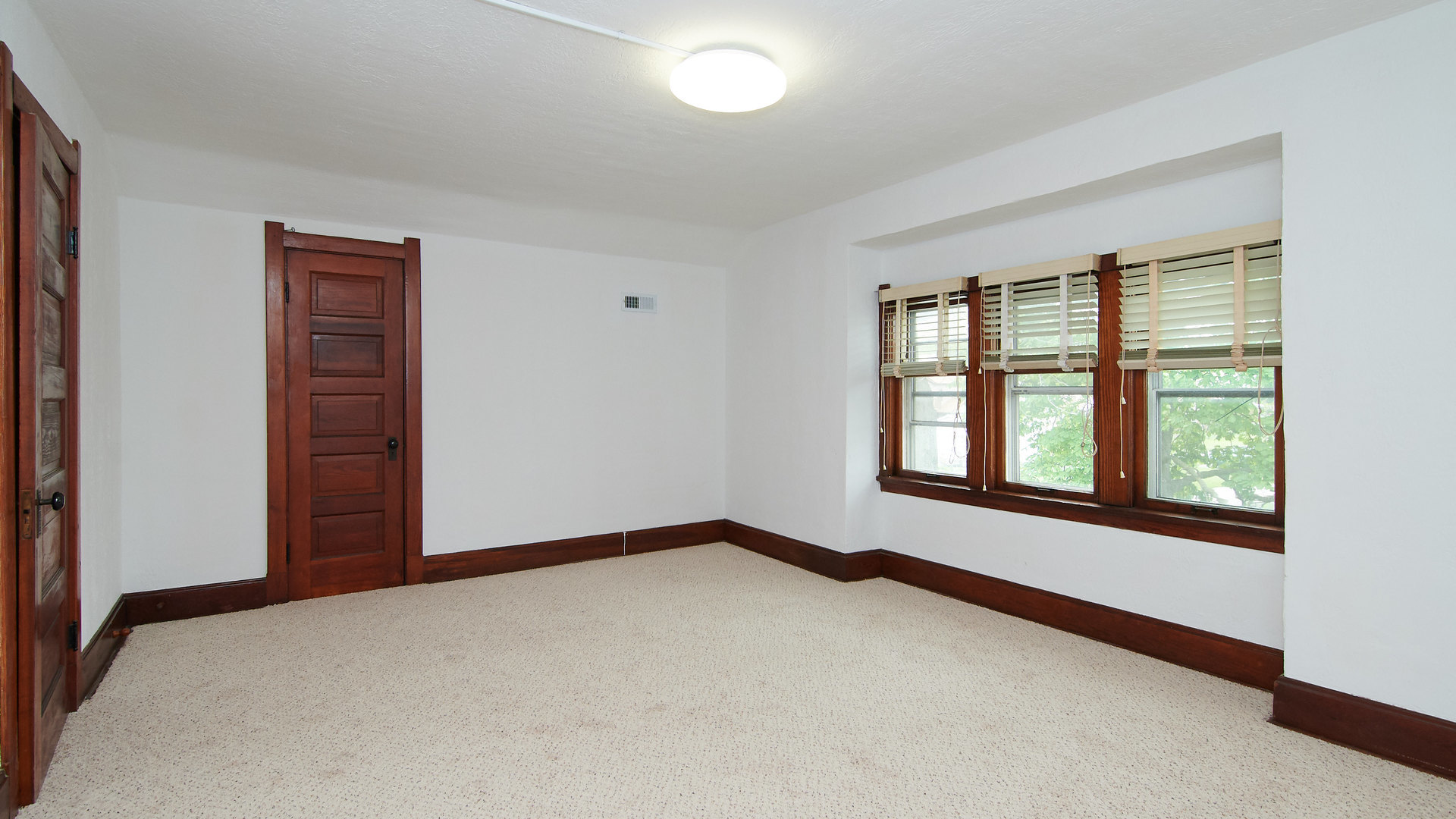 156 Eagle Point Road Fox Lake, IL 60020 - Photo 44 of 57 an empty room with windows