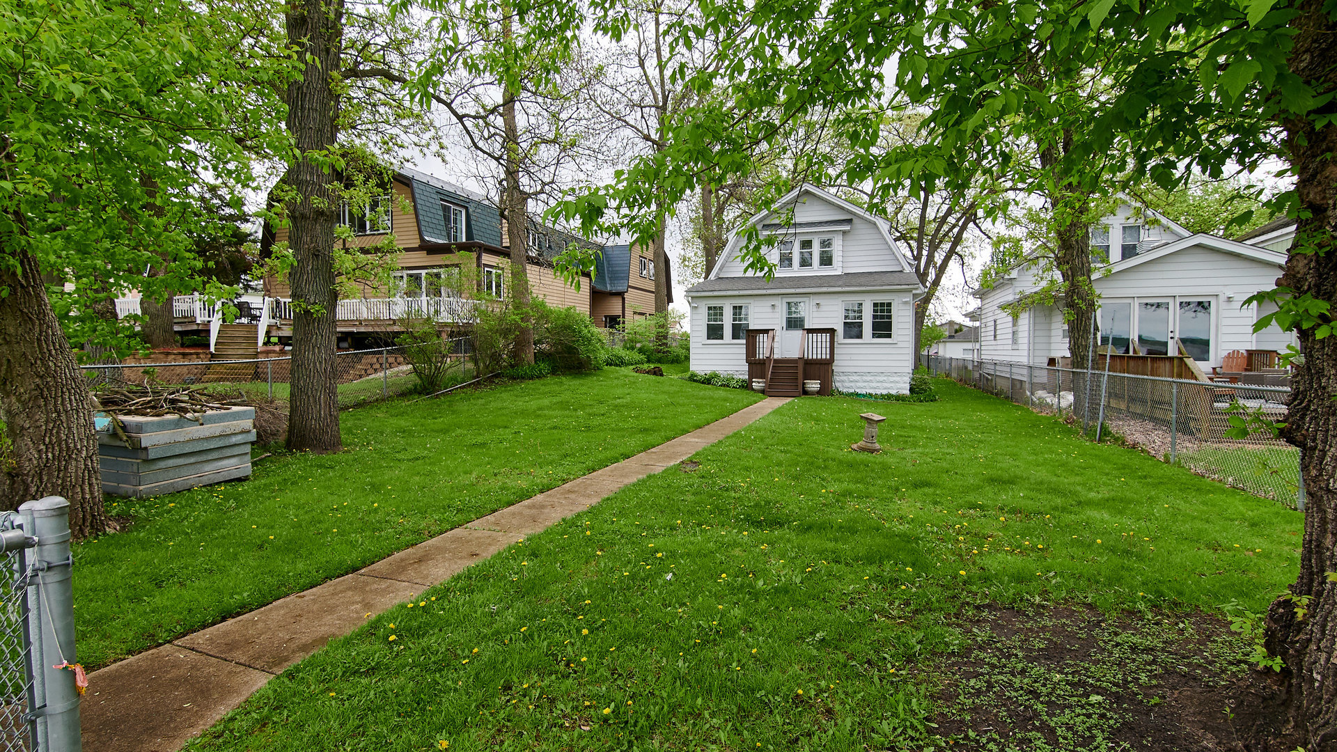 156 Eagle Point Road Fox Lake, IL 60020 - Photo 7 of 57 a house view with a garden space