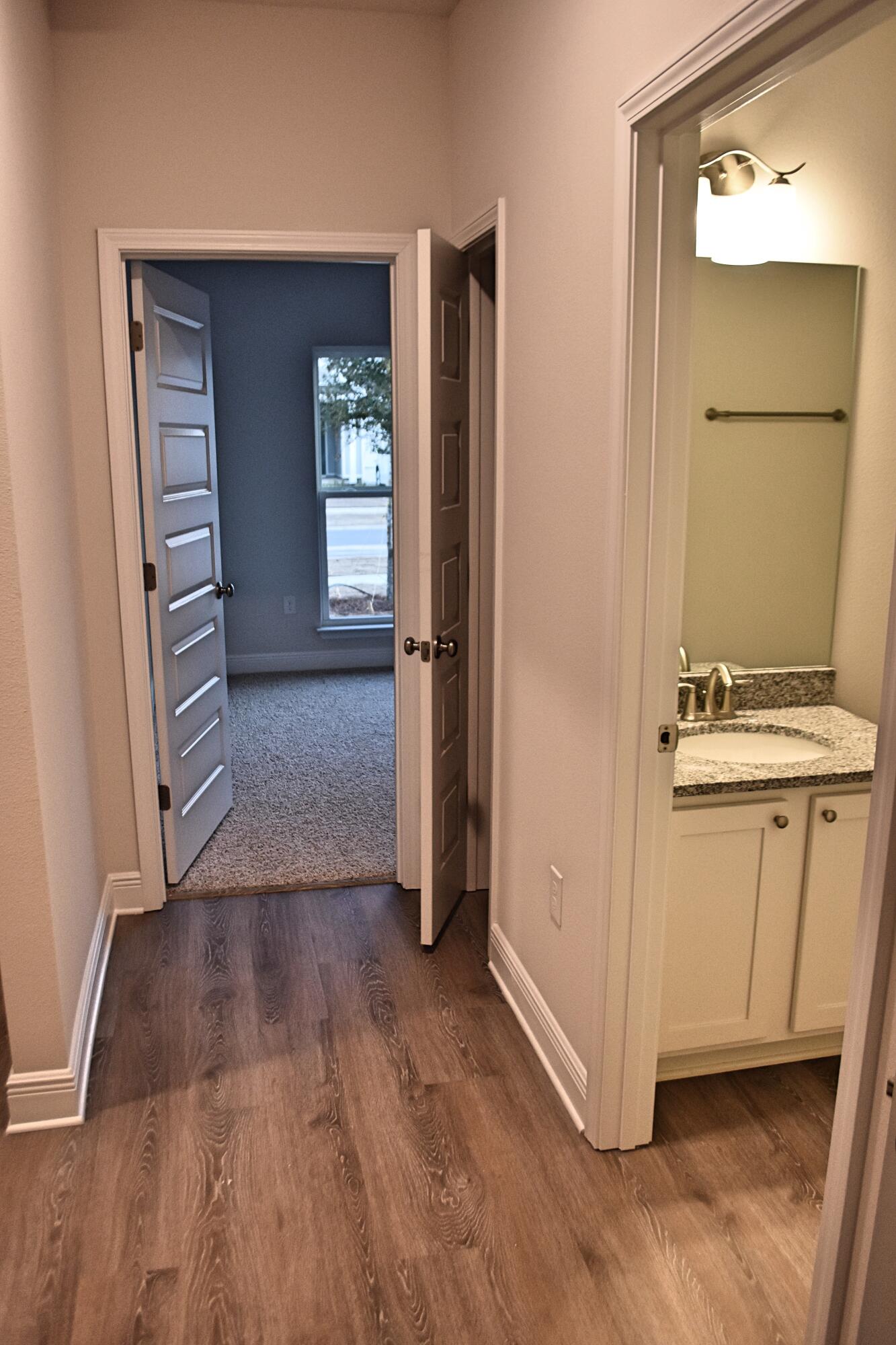 108 Dusky Way Freeport, FL 32439 - Photo 13 of 15 Hallway to additional beds and bath 2_Fo