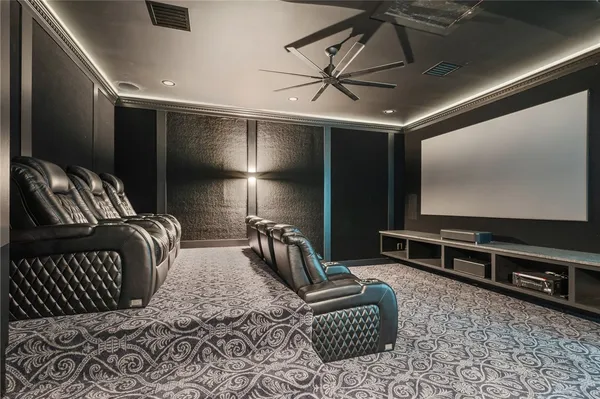 a bathroom with a granite countertop sink a mirror and a shower