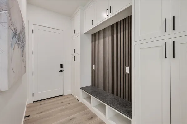 a view of an empty room with a sliding door
