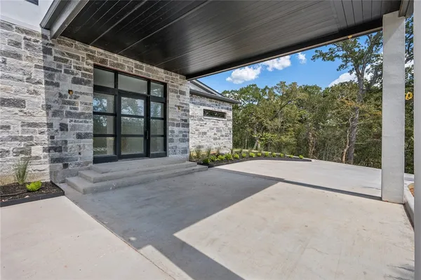 a view of a building with a garden