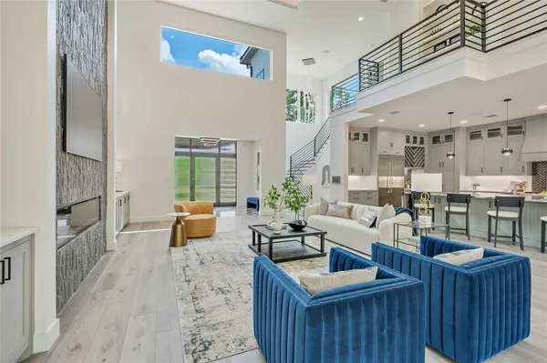 a living room with furniture and a table