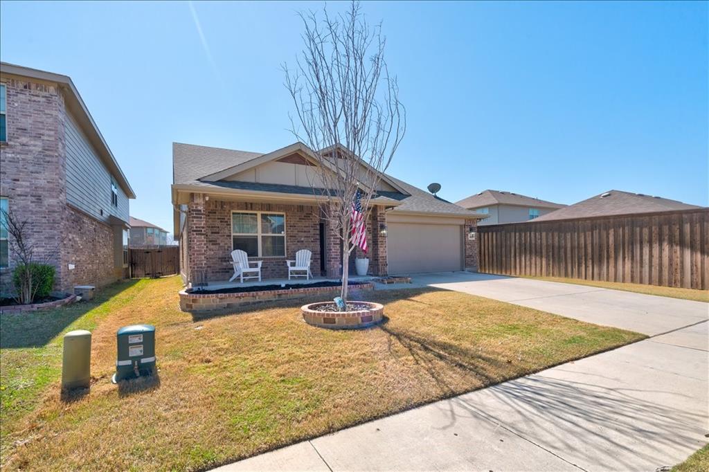 6233 Skysail Road Fort Worth, TX 76179 - Photo 27 of 30 a front view of a house with garden